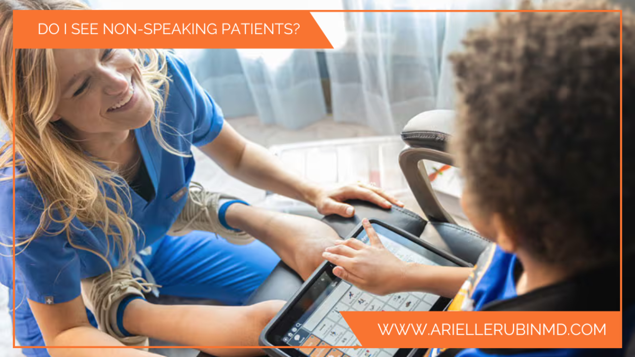 Speech language therapist working with non-speaking autistic child using AAC device